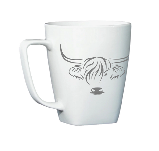 White mug with Highland Cow